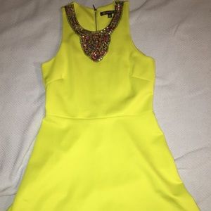 Scuba dress with beaded neckline